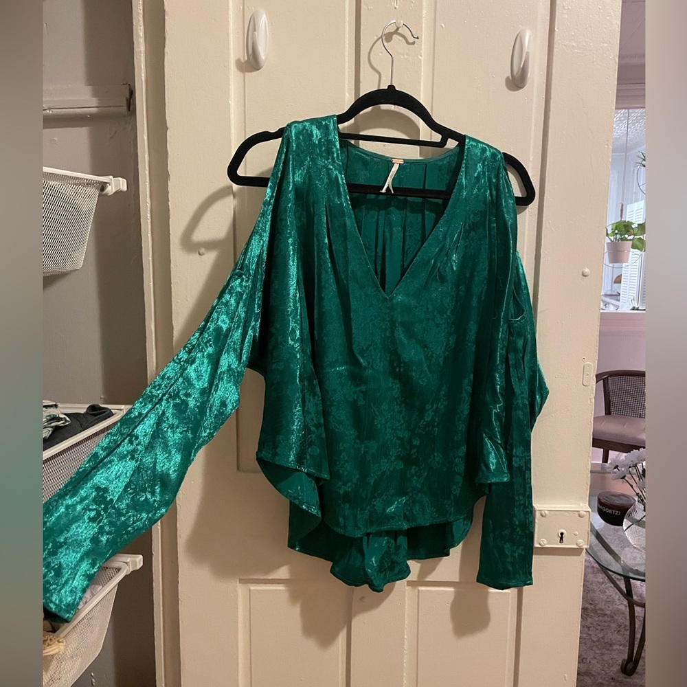 Teal green cutout blouse with floral detail
